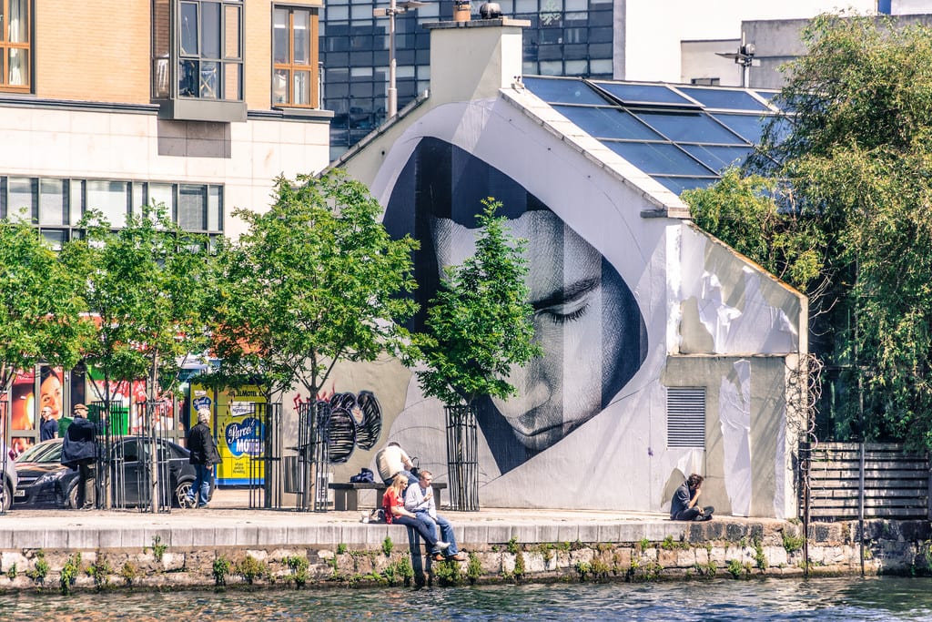 A couple enjoying the sun in Dublin City Centre