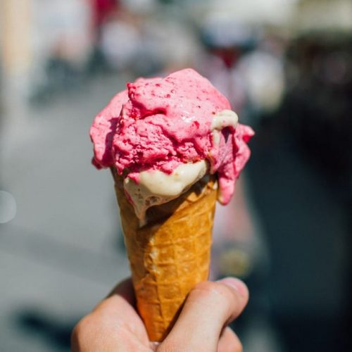 A guest enjoying an ice-cream at The Alex Hotel