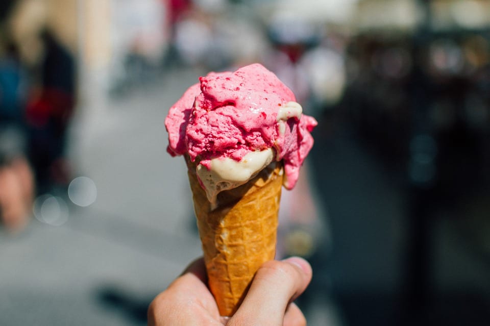 A guest enjoying an ice-cream at The Alex Hotel