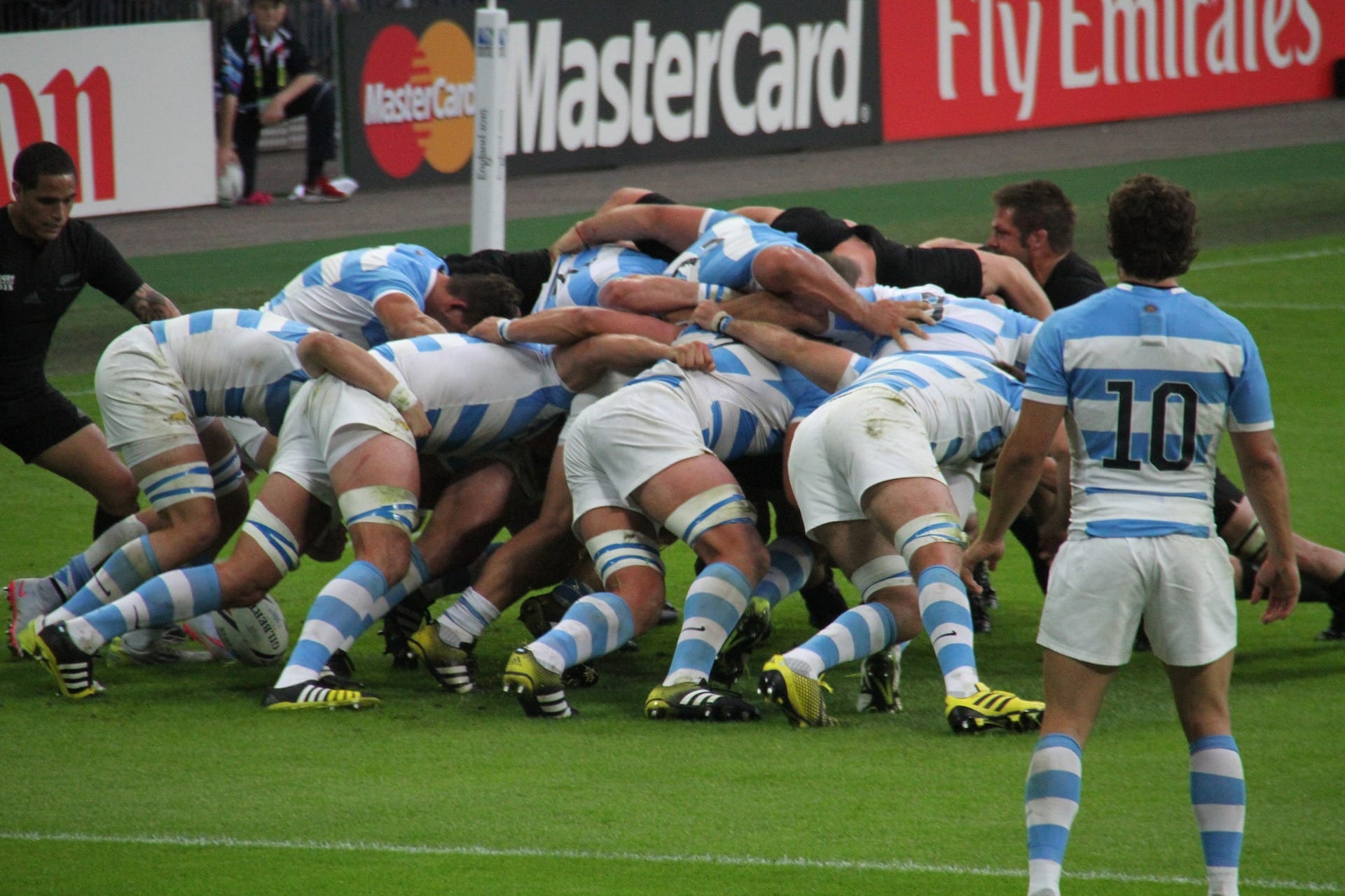 Players playing a rugby match
